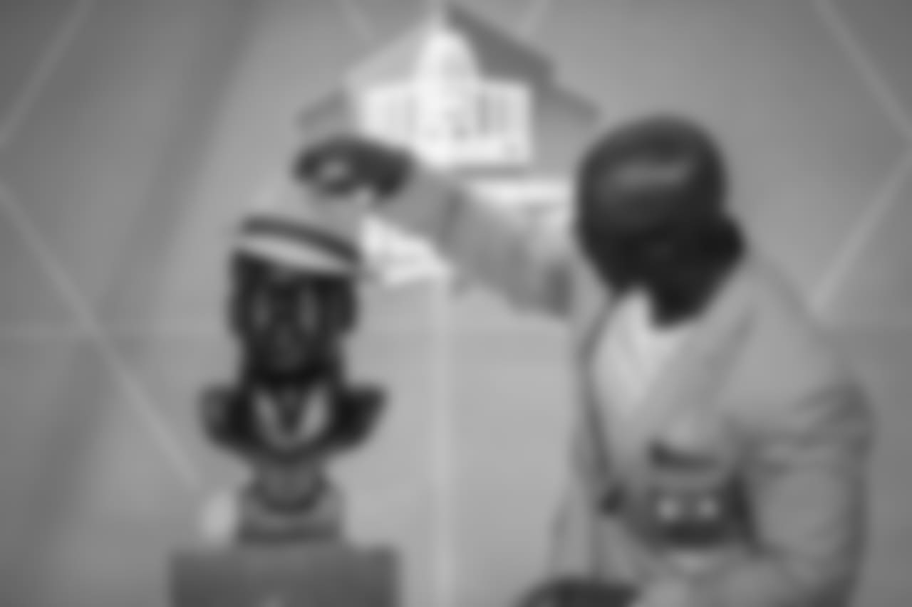 Brian Dawkins adds a little style to his bust
