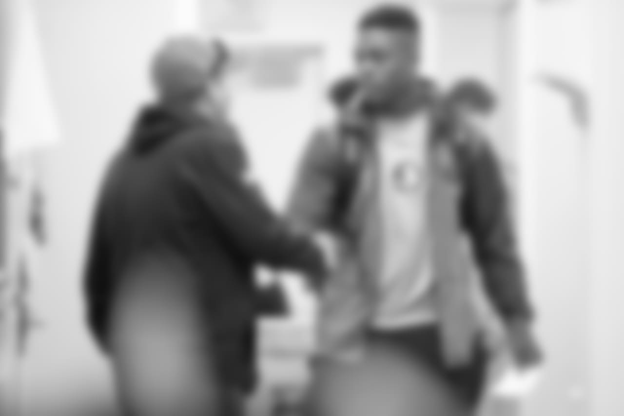 RB Ryan Green meets director of equipment operations Greg Delimitros.