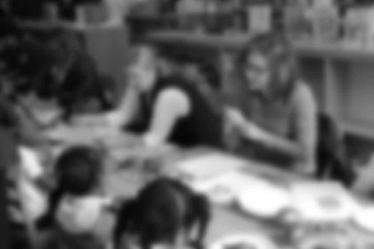 Fort Stewart Women’s Association and Atlanta Falcons Women’s Association making Gold Star Ornaments at an Elementary School with students for the living fallen soldier memorial at Fort Stewart.