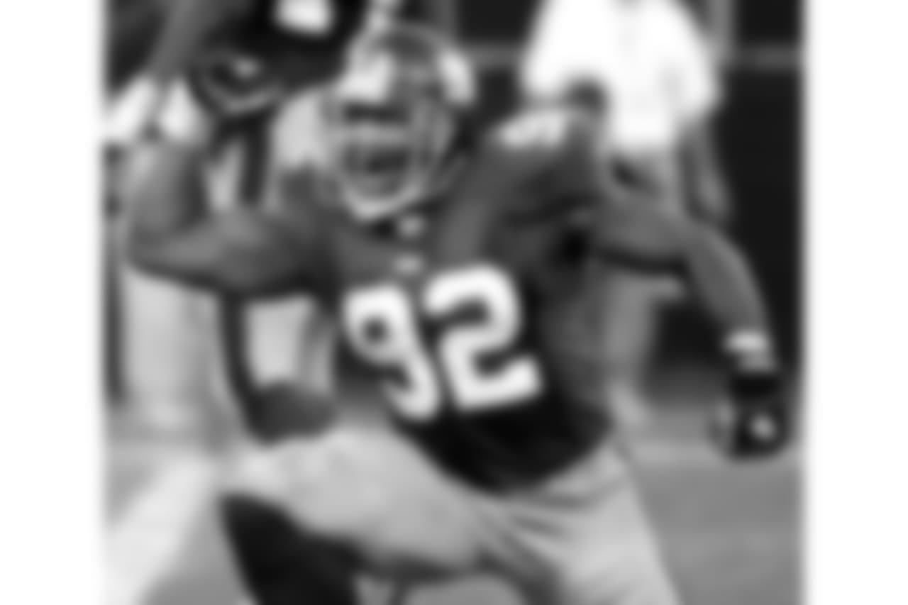 T-1. Michael Strahan -- 216 games (1993-07)