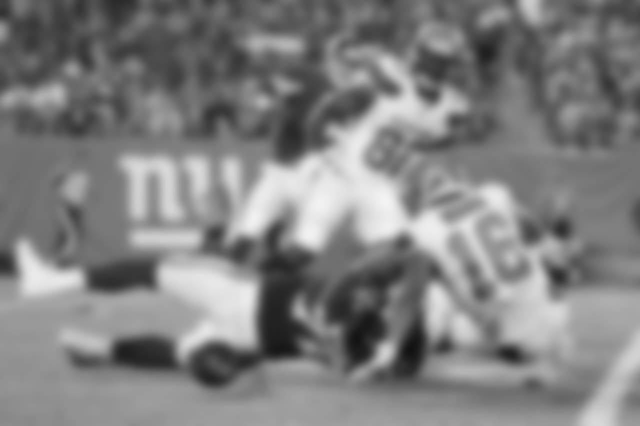 Cleveland Browns C.J. Board (16) fumbles as he is hit by New York Giants' Kerry Wynn (72) during the second half of a preseason NFL football game Thursday, Aug. 9, 2018, in East Rutherford, N.J. The Giants recovered the fumble. (AP Photo/Adam Hunger)