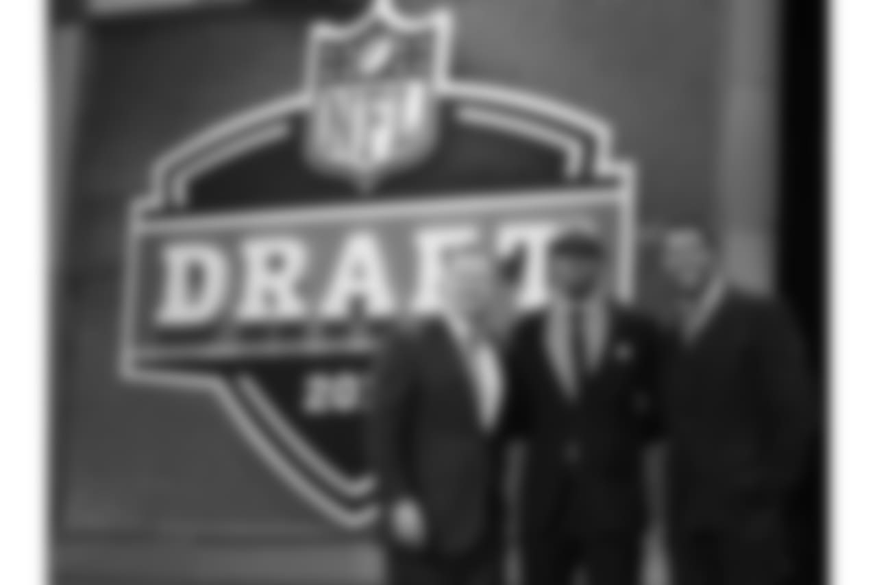 Louisiana State wide receiver Rueben Randle poses for photographs with NFL Commissioner Roger Goodell, left, and Michael Strahan, right, after being selected 63rd overall by the New York Giants in the second round of the NFL football draft at Radio City Music Hall, Friday, April 27, 2012, in New York. (AP Photo/Frank Franklin II)