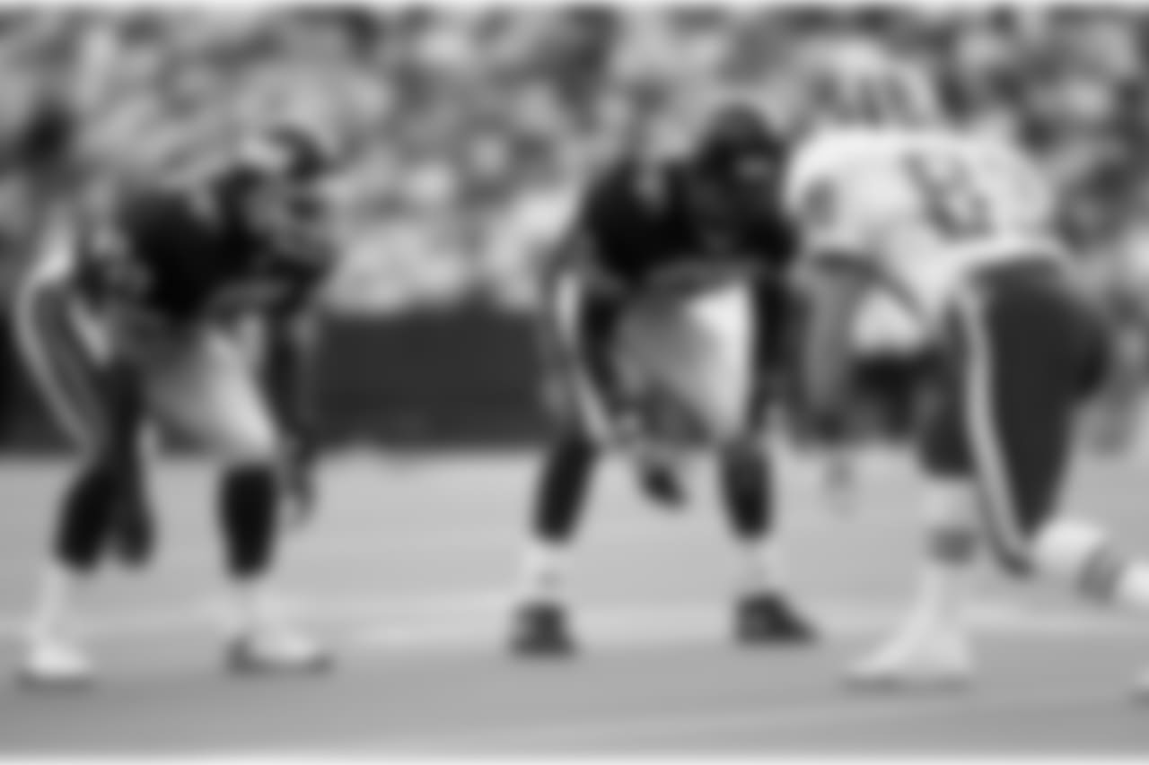 NFC cornerback Reyna Thompson (22) of the New York Giants and safety Mark Carrier (24) of the Chicago Bears line up opposite AFC punt team gunner Steve Tasker (89) of the Buffalo Bills during the NFC's 23-21 loss to the AFC in the 1991 NFL Pro Bowl.