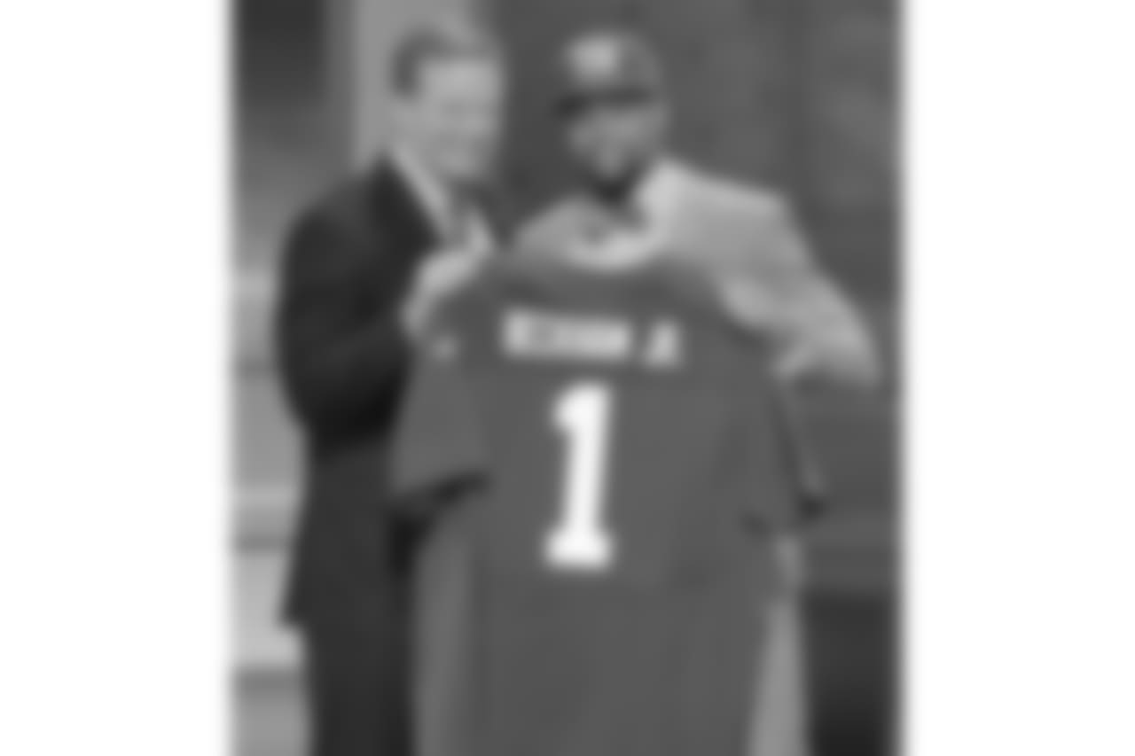Louisiana State wide receiver Odell Beckam Jr. poses with NFL commissioner Roger Goodell after being selected by the New York Giants as the 12th pick in the first round of the 2014 NFL Draft, Thursday, May 8, 2014, in New York. (AP Photo/Frank Franklin II)