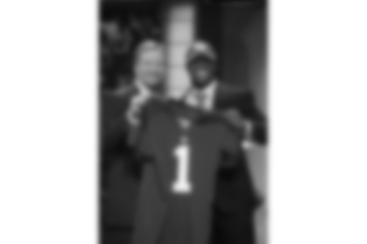 Nebraska cornerback Prince Amukamara poses for photographs with NFL commissioner Roger Goodell after he was selected as the 19th overall pick by the New York Giants in the first round of the NFL football draft at Radio City Music Hall on Thursday, April 28, 2011, in New York. (AP Photo/Jason DeCrow)