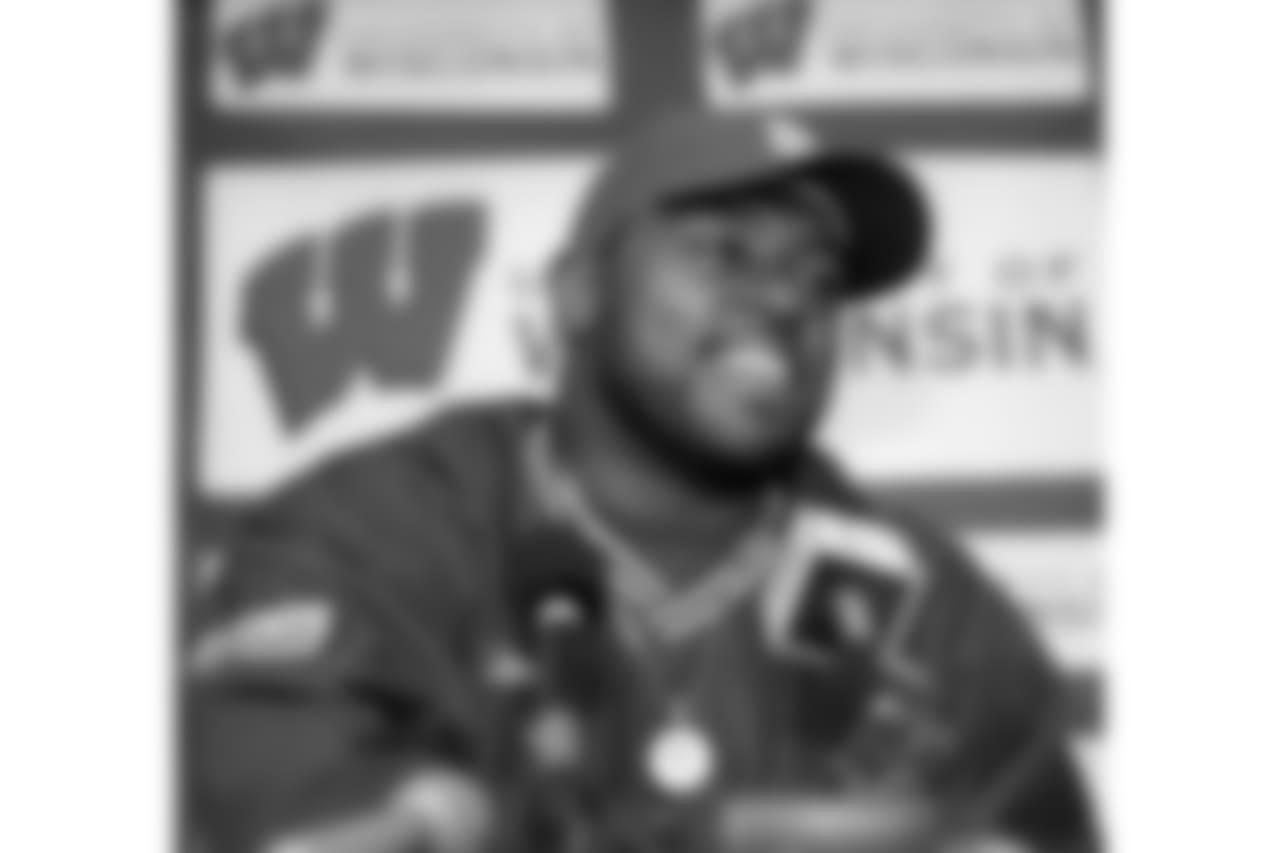 Ron Dayne, Wisconsin tailback and Heisman Trophy winner, talks to reporters Saturday, April 15, 2000, in Madison, Wis., after being picked by the New York Giants in the NFL draft. Dayne was picked 11th overall in the first round. (AP Photo/Andy Manis)