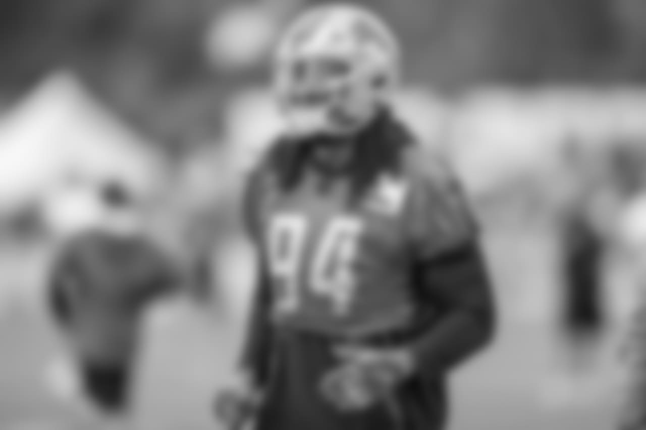 Detroit Lions defensive end Ziggy Ansah (94) warms up before training camp practice on Monday, Aug. 6, 2018 in Allen Park, Mich. (Detroit Lions via AP)