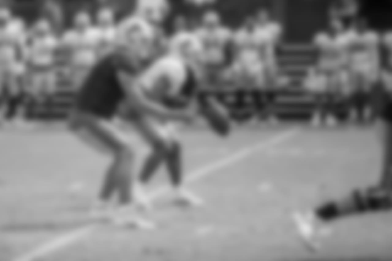 Detroit Lions quarterback Matthew Stafford (9) takes the snap during training camp practice on Tuesday, Aug. 7, 2018 in Napa, Calif. (Detroit Lions via AP)