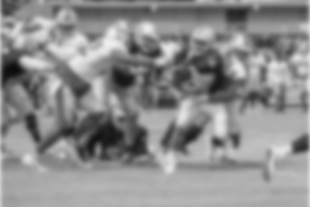 Detroit Lions linebacker Devon Kennard (42) makes a tackle during joint training camp practice with the Oakland Raiders on Wednesday, Aug. 8, 2018 in Napa, Calif. (Detroit Lions via AP)