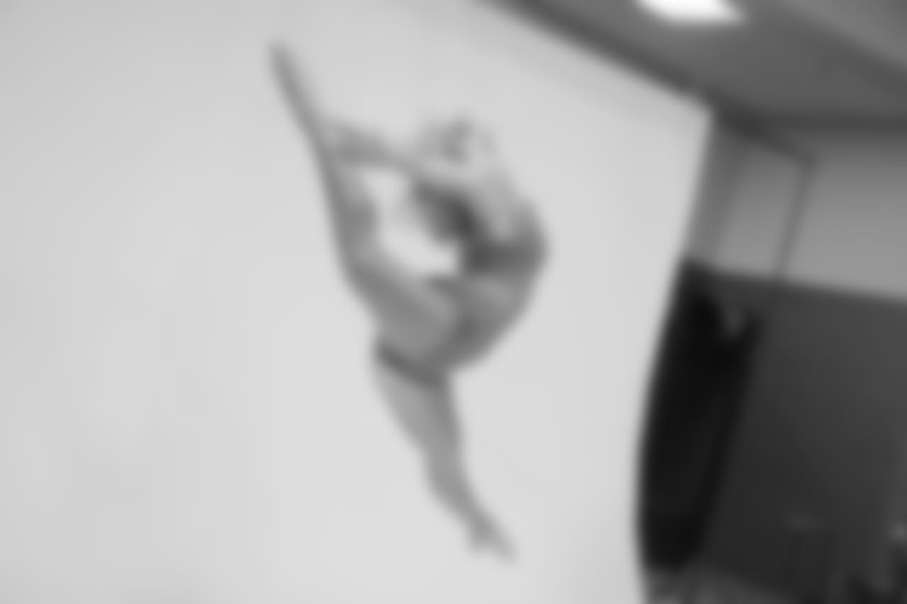 Kaitlyne's jump is flawless in her last photo of the day