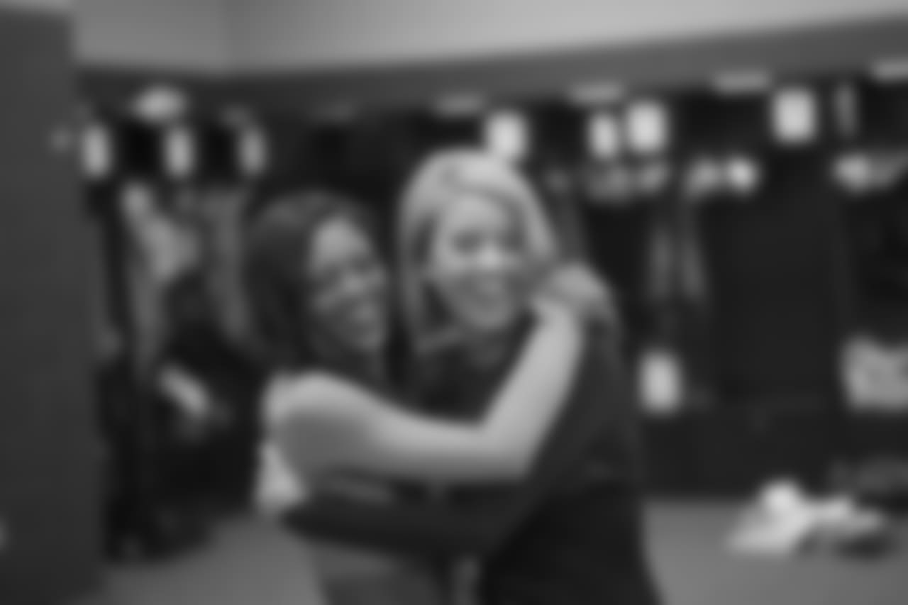 Shannon and Annalise hug each other in between photo sessions