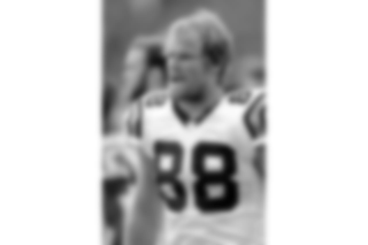 Carolina Panthers tight end Greg Olsen talks to teammates during the first half of an NFL football game against the Buffalo Bills, Thursday, Aug. 9, 2018, in Orchard Park, N.Y. (AP Photo/Adrian Kraus)