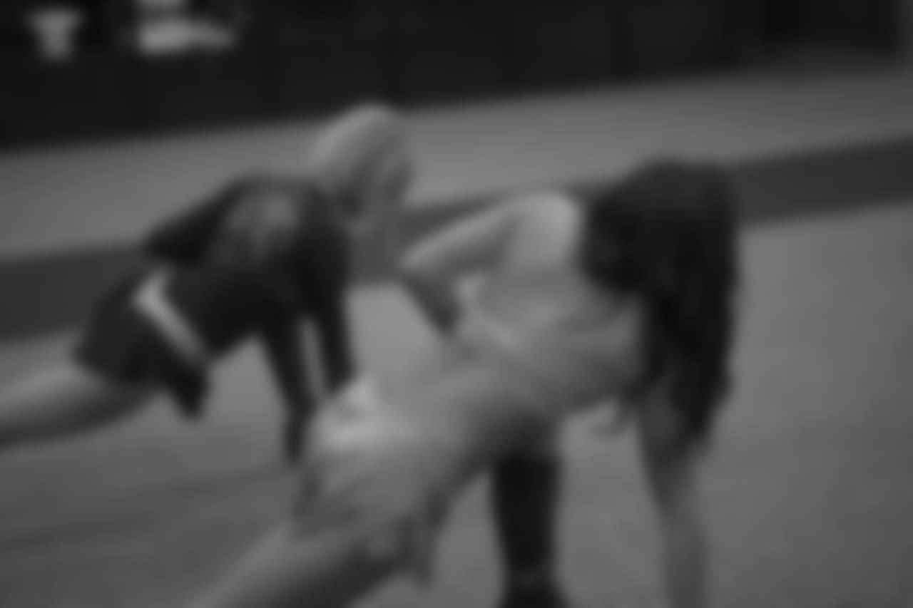 Annalise and Shannon stretch before their next photo session