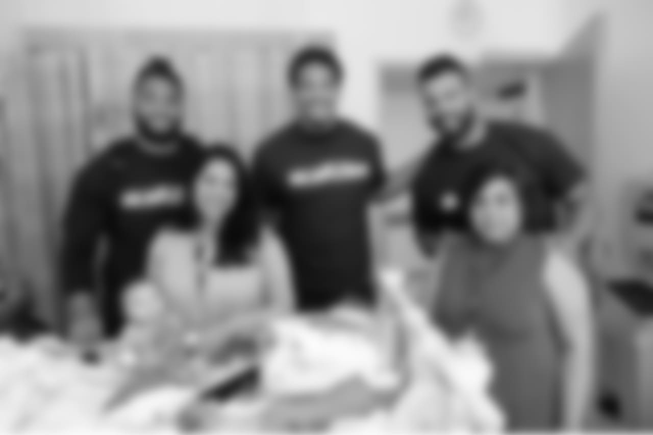 BOSTON, MA - MAY 16: New England Patriots (L to R) Harvey Langi, Derek Rivers, and Kyle Van Noy visit with Varun and family at Boston Children's Hospital on May 16, 2018 in Boston, Massachusetts. (Photo by Darren McCollester/Getty Images for Boston Children's Hospital)