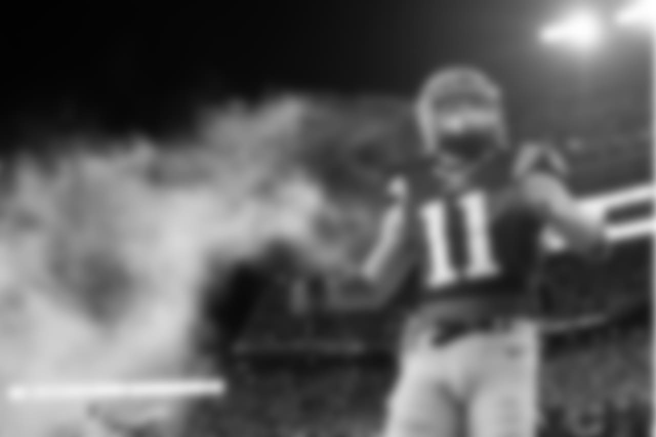 New England Patriots wore receiver Julian Edelman (11) enters the field before the divisional playoff game against the Houston Texans Saturday January 14, 2017 in Foxboro, Mass. (Damian Strohmeyer via AP)