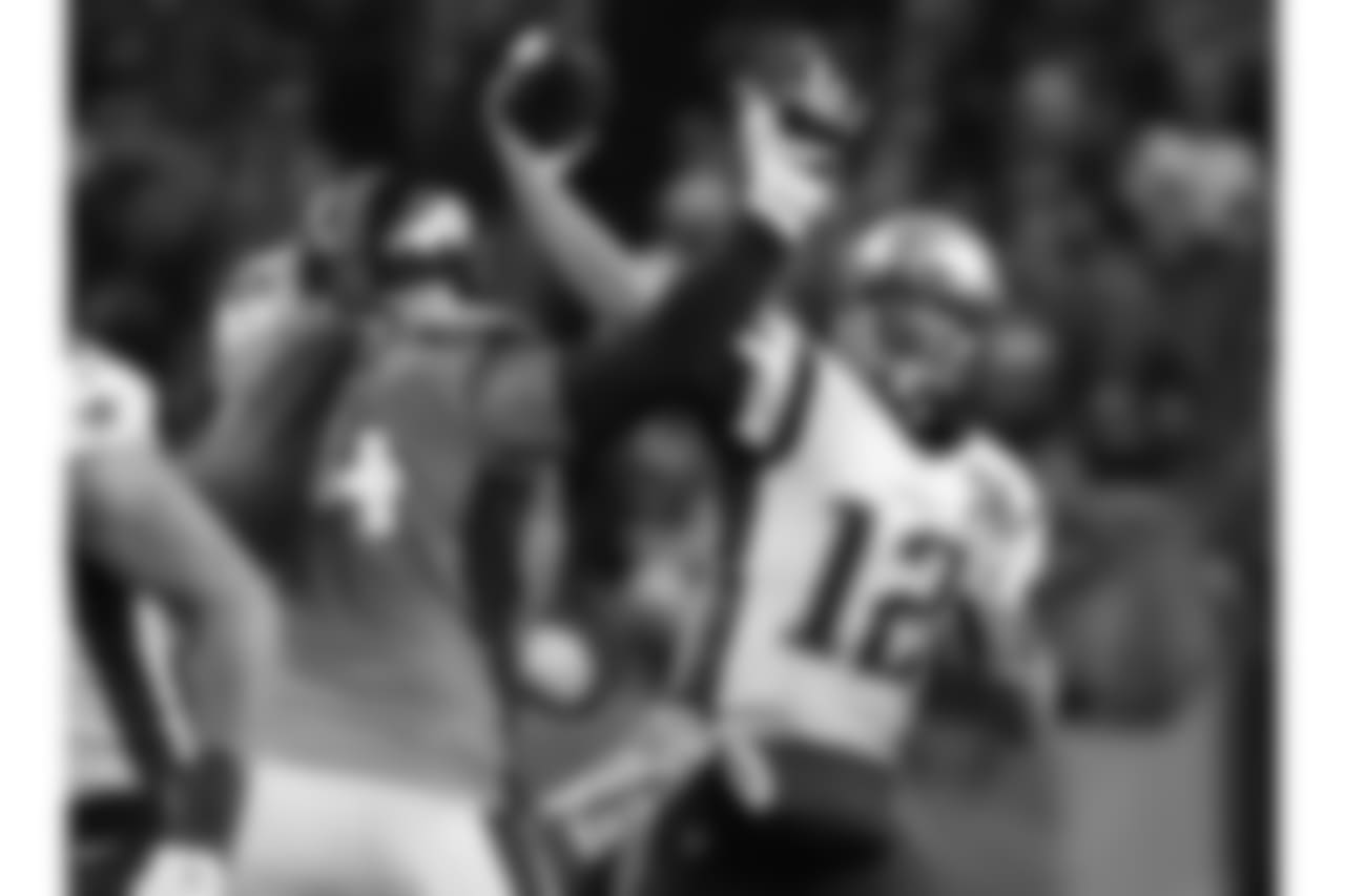 New England Patriots quarterback Tom Brady (12) throws against the Denver Broncos during the second half of an NFL football game, Sunday, Nov. 12, 2017, in Denver. (AP Photo/Jack Dempsey)