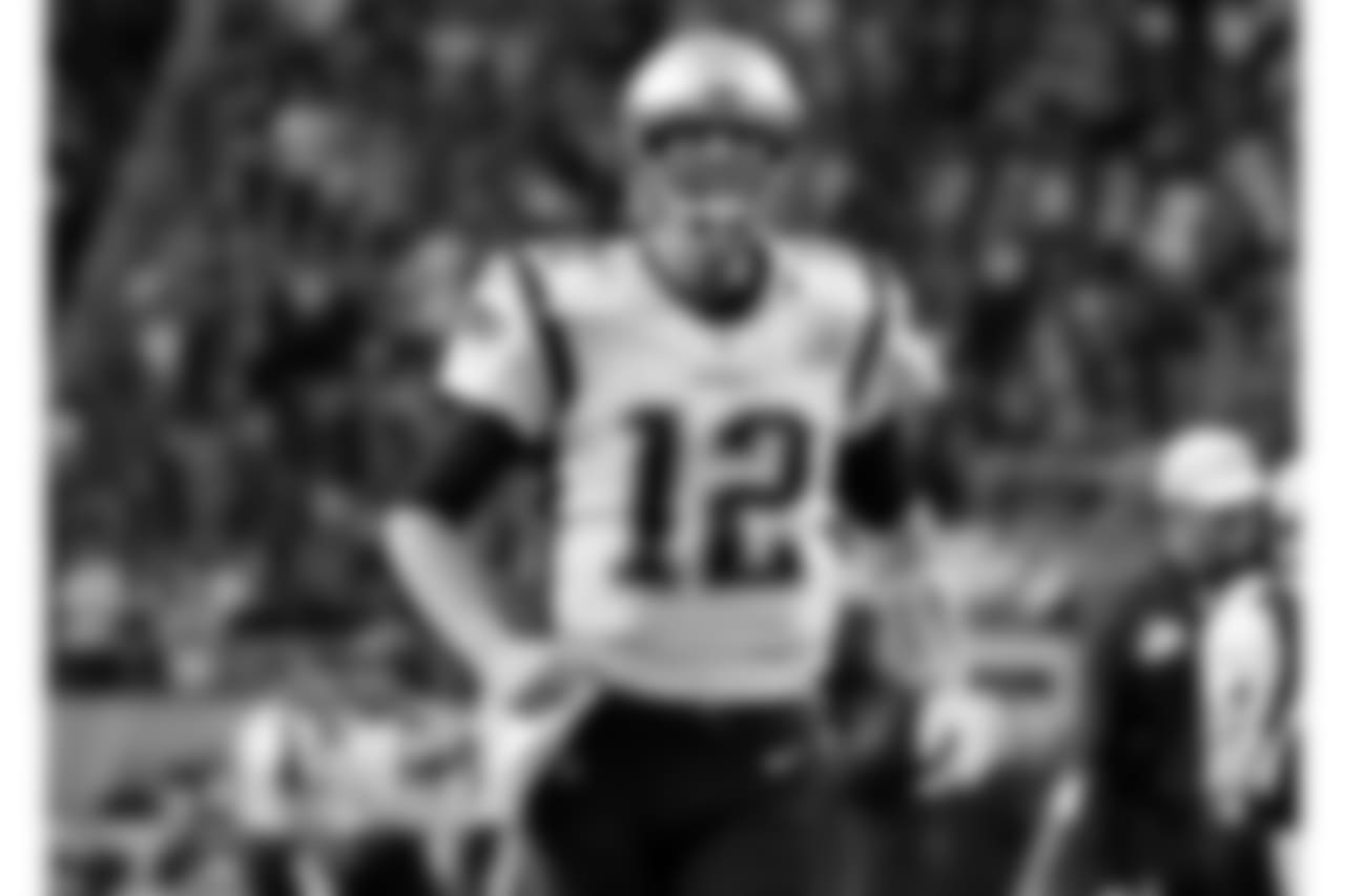 New England Patriots quarterback Tom Brady (12), runs to the field to warmup before the NFL Super Bowl 52 football game against the Philadelphia Eagles, Sunday, Feb. 4, 2018, in Minneapolis. (AP Photo/Frank Franklin II)