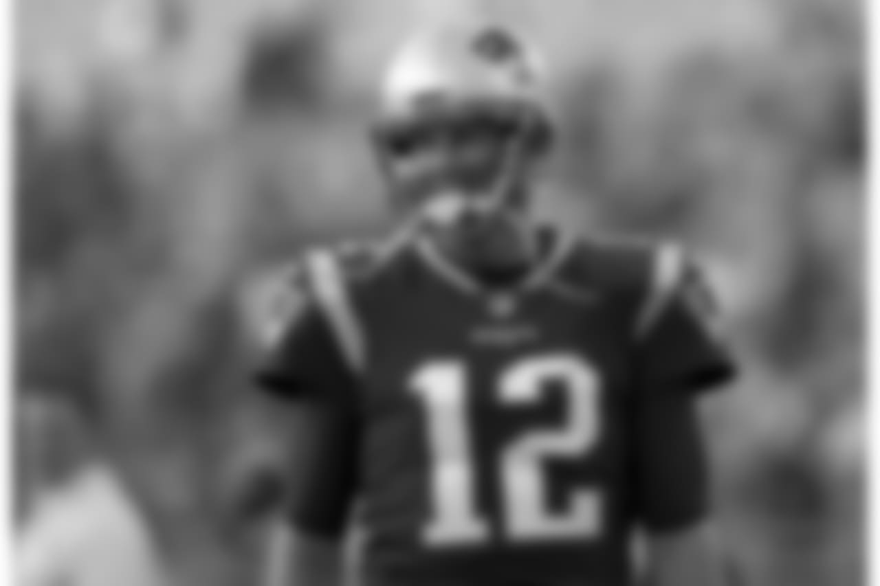 New England Patriots quarterback Tom Brady smiles as he takes the field to warm up before a preseason NFL football game against the Washington Redskins, Thursday, Aug. 9, 2018, in Foxborough, Mass. (AP Photo/Charles Krupa)