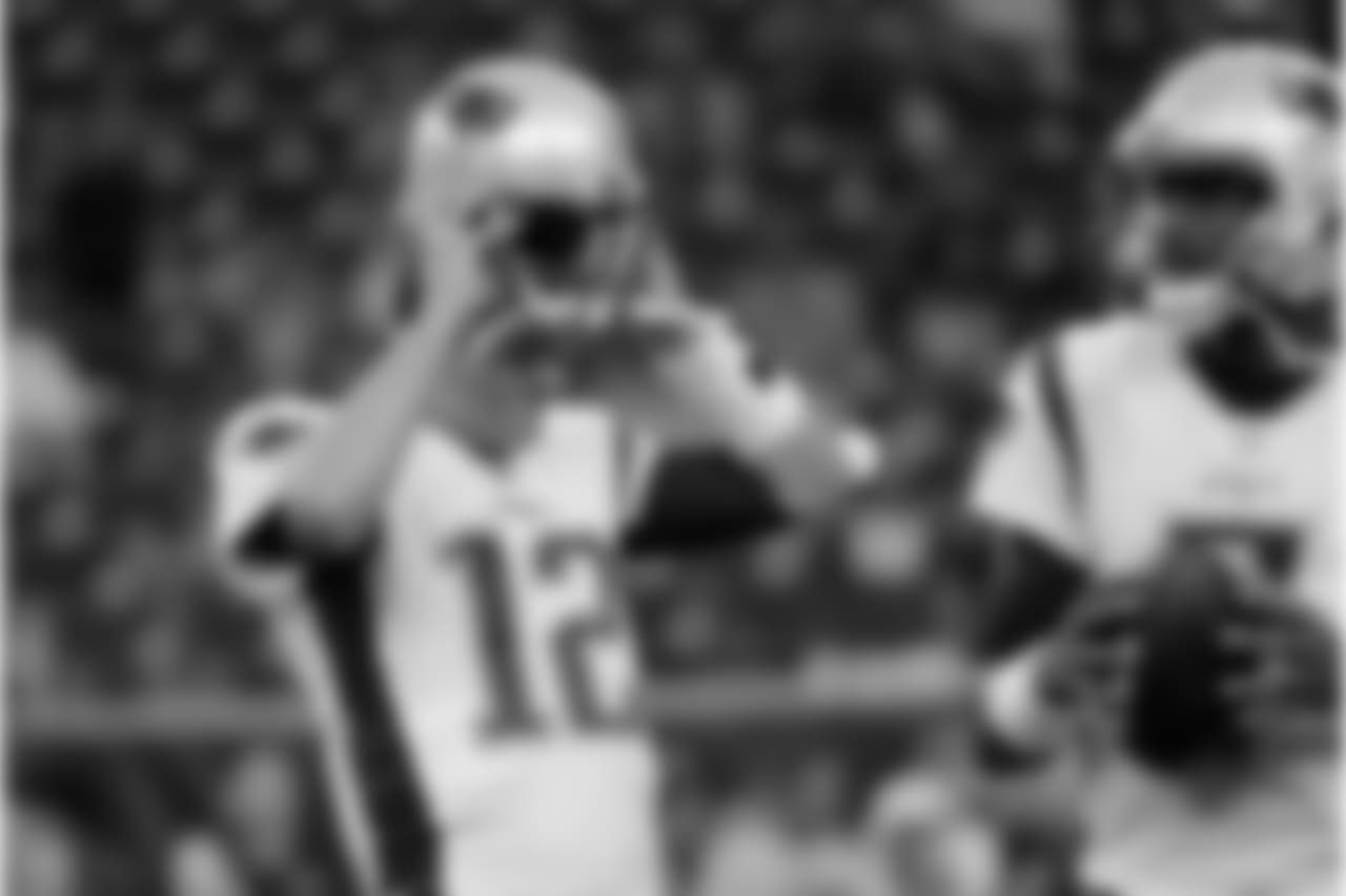 New England Patriots quarterback Tom Brady (12) and quarterback Jacoby Brissett (7) warm up before an NFL football preseason game against the Houston Texans Saturday, Aug. 19, 2017, in Houston. (AP Photo/David J. Phillip)