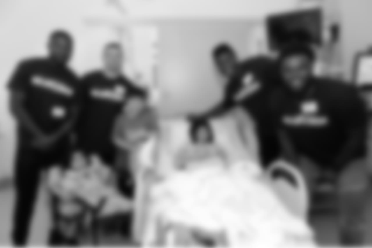 BOSTON, MA - JUNE 20: New England Patriot's rookies (L to R) Duke Dawson, Braxton Berrios, Christian Sam, and Ja'Whaun Bentley visit Victoria at Boston Children's Hospital June 20, 2018 in Boston, Massachusetts. (Photo by Darren McCollester/Getty Images for Boston Children's Hospital)