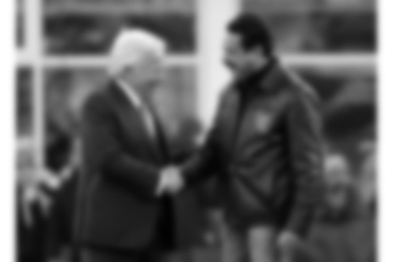 New England Patriots owner Robert Kraft, left, shakes hands with Jacksonville Jaguars owner Shahid Khan before the AFC championship NFL football game, Sunday, Jan. 21, 2018, in Foxborough, Mass. (AP Photo/Steven Senne)