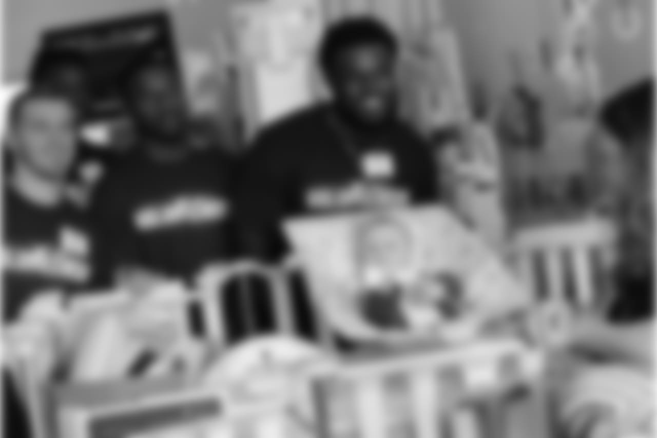 BOSTON, MA - JUNE 20: New England Patriot's rookies (L to R) Braxton Berrios, Duke Dawson, and Ja'Whaun Bentley visit Isaac at Boston Children's Hospital June 20, 2018 in Boston, Massachusetts. (Photo by Darren McCollester/Getty Images for Boston Children's Hospital)