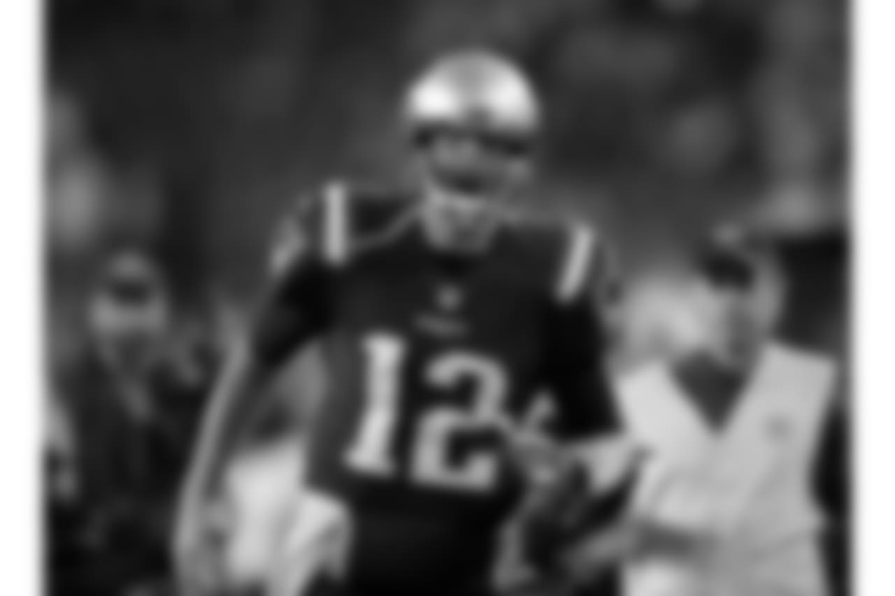 New England Patriots quarterback Tom Brady gets pumped up as he runs onto the field before an NFL football game against the Atlanta Falcons, Sunday, Oct. 22, 2017, in Foxborough, Mass. (AP Photo/Charles Krupa)