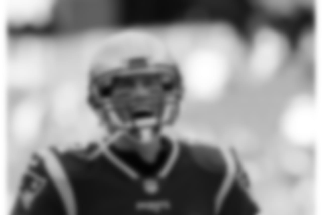 New England Patriots quarterback Tom Brady charges onto the field before an NFL football game against the Miami Dolphins, Sunday, Nov. 26, 2017, in Foxborough, Mass. (AP Photo/Michael Dwyer)