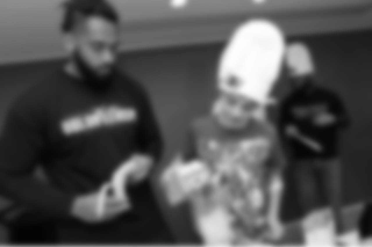 BOSTON, MA - MAY 16: New England Patriot Harvey Langi makes smoothies with Evan at Boston Children's Hospital on May 16, 2018 in Boston, Massachusetts. (Photo by Darren McCollester/Getty Images for Boston Children's Hospital)