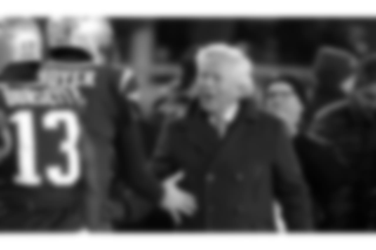 New England Patriots owner Robert Kraft, right, greets backup quarterback Brian Hoyer (2) before an NFL divisional playoff football game against the Tennessee Titans, Saturday, Jan. 13, 2018, in Foxborough, Mass. (AP Photo/Charles Krupa)