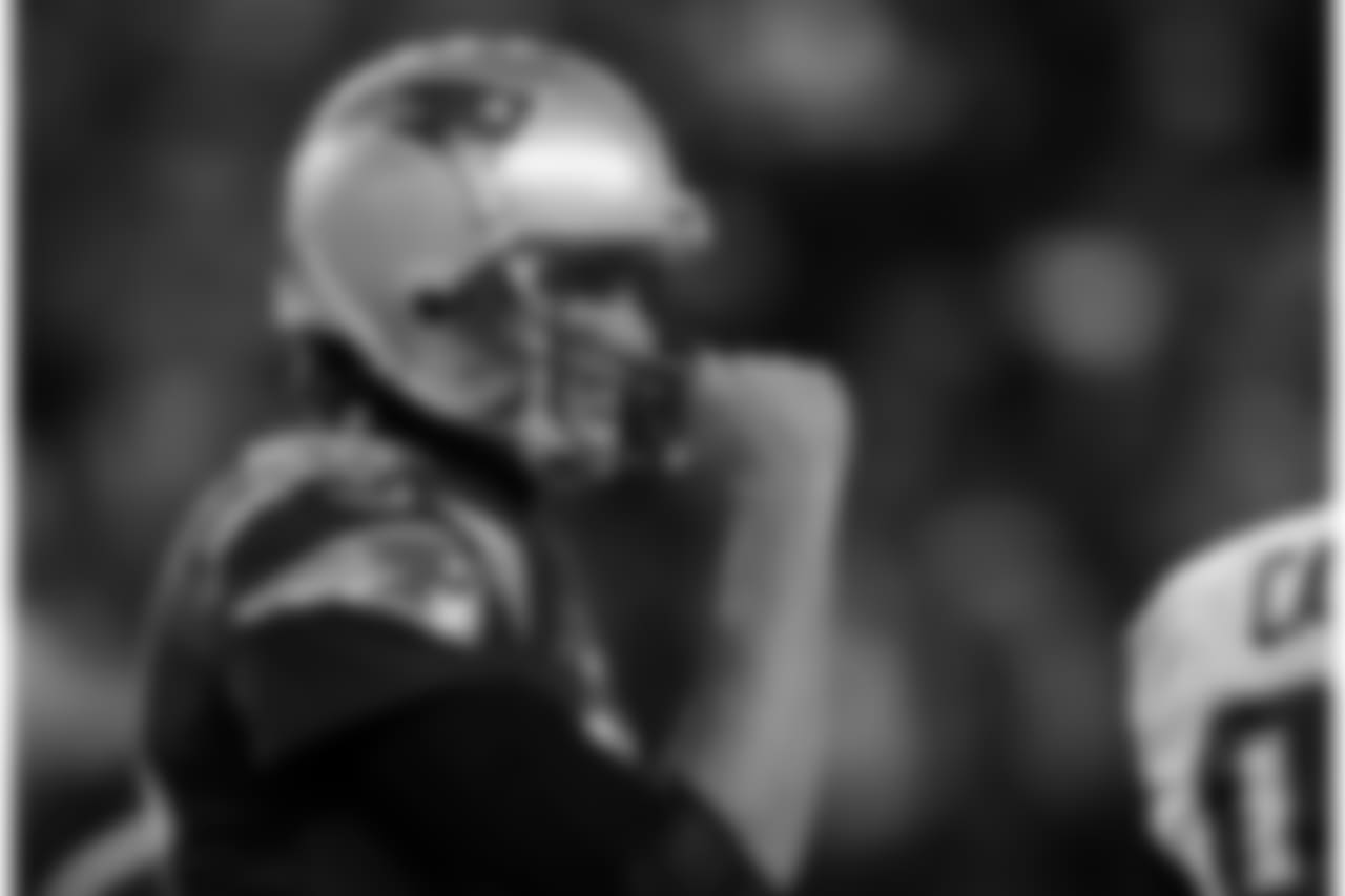 New England Patriots quarterback Tom Brady celebrates his touchdown pass to Chris Hogan during the first half of an NFL divisional playoff football game against the Tennessee Titans, Saturday, Jan. 13, 2018, in Foxborough, Mass. (AP Photo/Charles Krupa)