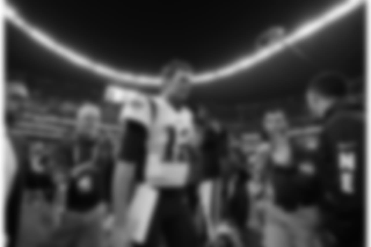 New England Patriots quarterback Tom Brady walks off the field after an NFL football game against the Oakland Raiders, Sunday, Nov. 19, 2017, in Mexico City. (AP Photo/Eduardo Verdugo)