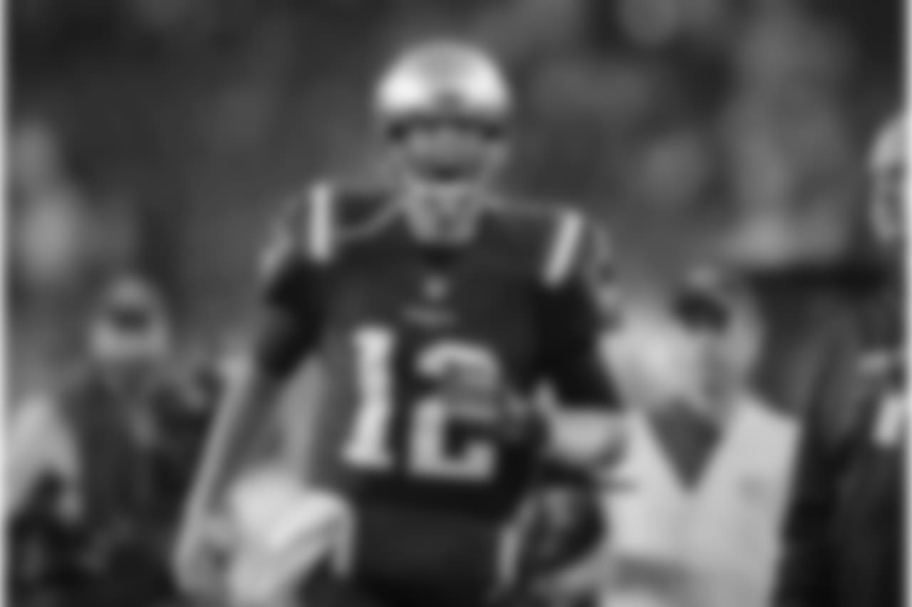 New England Patriots quarterback Tom Brady gets pumped up as he runs onto the field before an NFL football game against the Atlanta Falcons, Sunday, Oct. 22, 2017, in Foxborough, Mass. (AP Photo/Charles Krupa)