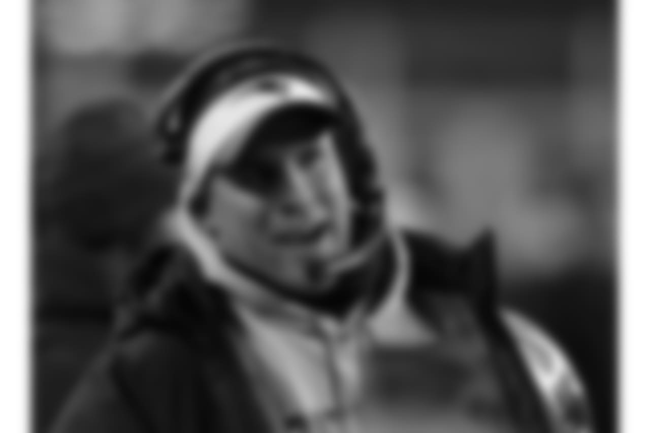 New England Patriots offensive coordinator Josh McDaniels watches from the sideline during the second half of an NFL divisional playoff football game against the Tennessee Titans, Saturday, Jan. 13, 2018, in Foxborough, Mass. (AP Photo/Charles Krupa)