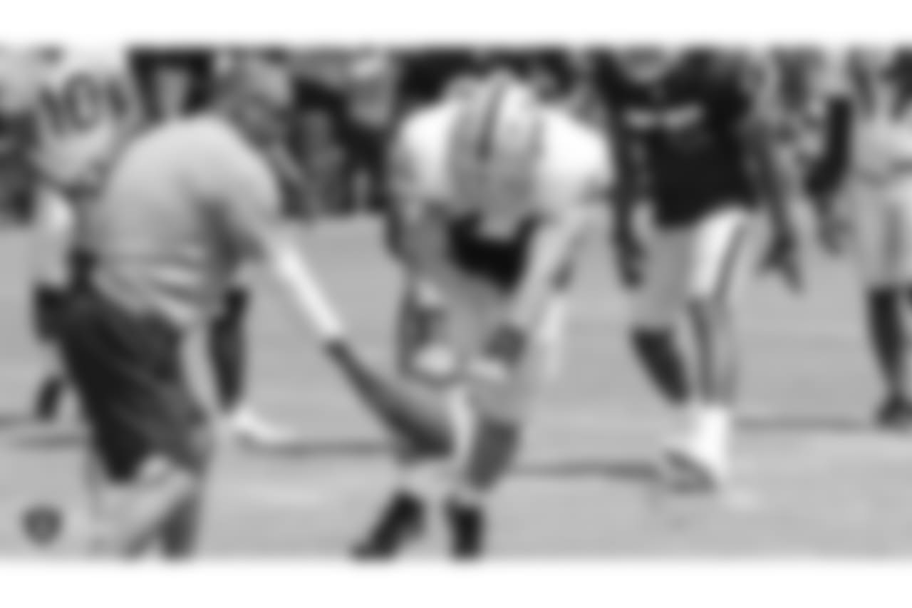 Oakland Raiders assistant head coach and special teams coordinator Rich Bisaccia and fullback Ryan Yurachek (44) on the field for practice at 2018 Training Camp at The Oakland Raiders Napa Valley Training Complex, Monday, July 30, 2018, in Napa, California.
