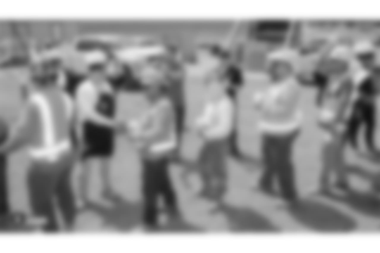 Oakland Raiders owner, Mark Davis, and other staff members from The Oakland Raiders front office spend the day with construction workers of the Las Vegas Stadium worksite by handing out lunches and sharing a meal, Wednesday, June 28, 2018, at the Las Vegas Stadium worksite in Las Vegas, Nevada.