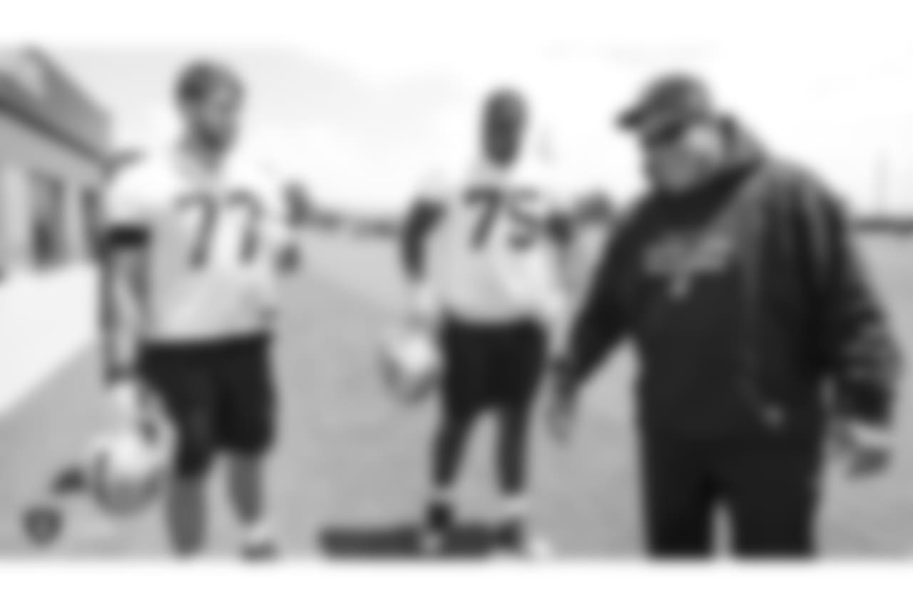Oakland Raiders offensive tackle Kolton Miller (77), offensive tackle Brandon Parker (75), and general manager Reggie McKenzie at an Organized Team Activity (OTA) at the Oakland Raiders Practice Facility, Thursday, May 31, 2018, in Alameda, California.