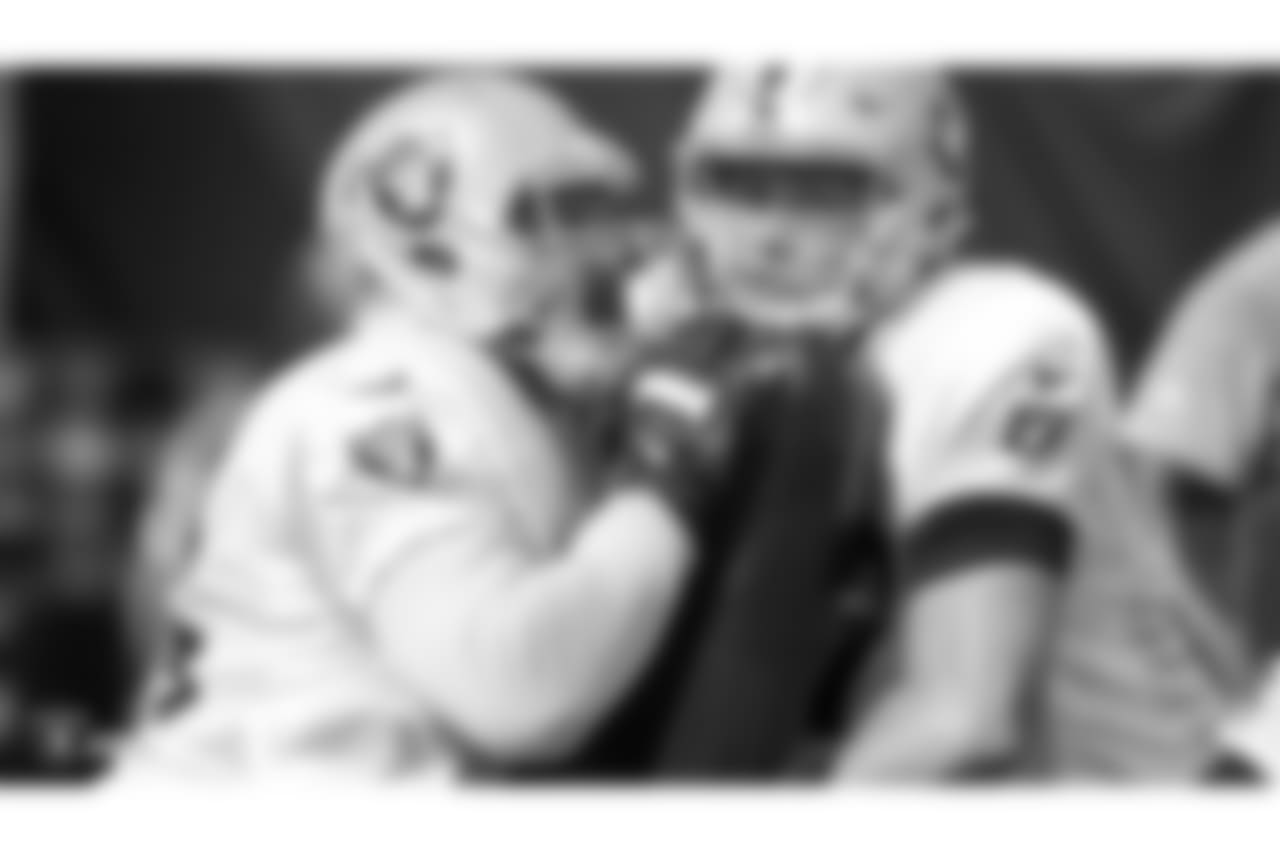 Oakland Raiders offensive guard Jon Feliciano (76) and offensive tackle Kolton Miller (77) on the field for practice at 2018 Training Camp at The Oakland Raiders Napa Valley Training Complex, Monday, August 6, 2018, in Napa, California.