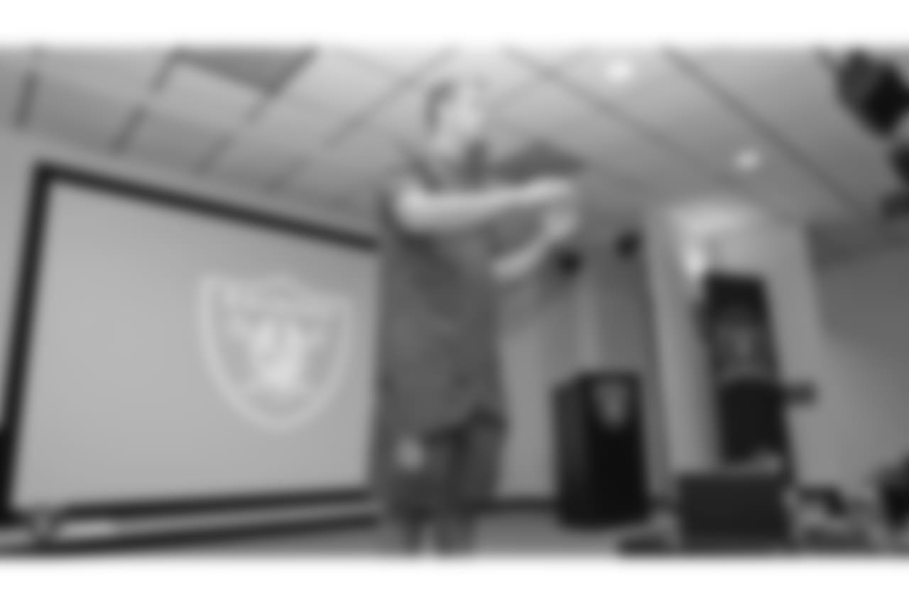Oakland Raiders rookies listen to speaker Derek Carr, Oakland Raiders quarterback, as part of Rookie Academy, at the Oakland Raiders Practice Facility, Monday, June 18, 2018, in Alameda, California.