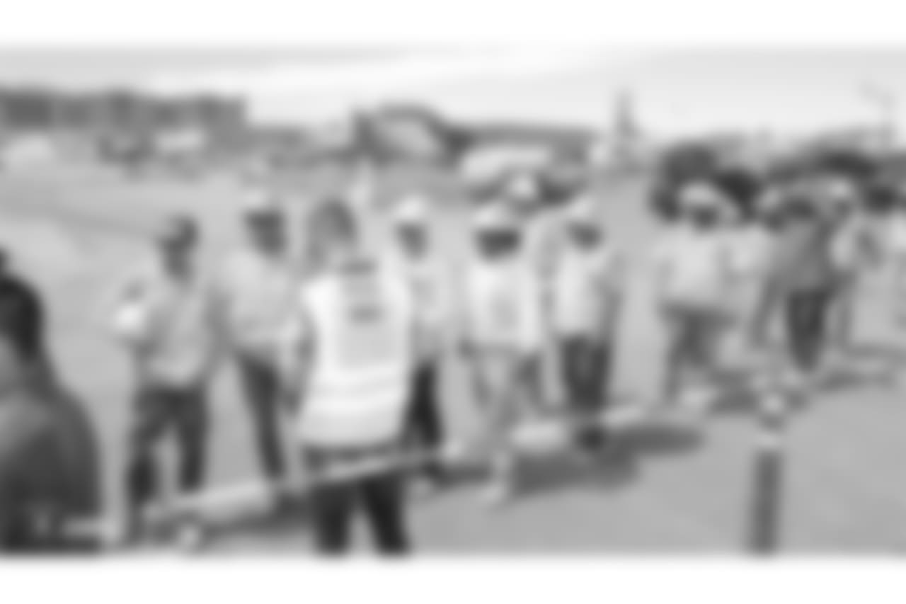Staff members from The Oakland Raiders front office spend the day with construction workers of the Las Vegas Stadium worksite by handing out lunches and sharing a meal, Wednesday, June 28, 2018, at the Las Vegas Stadium worksite in Las Vegas, Nevada.