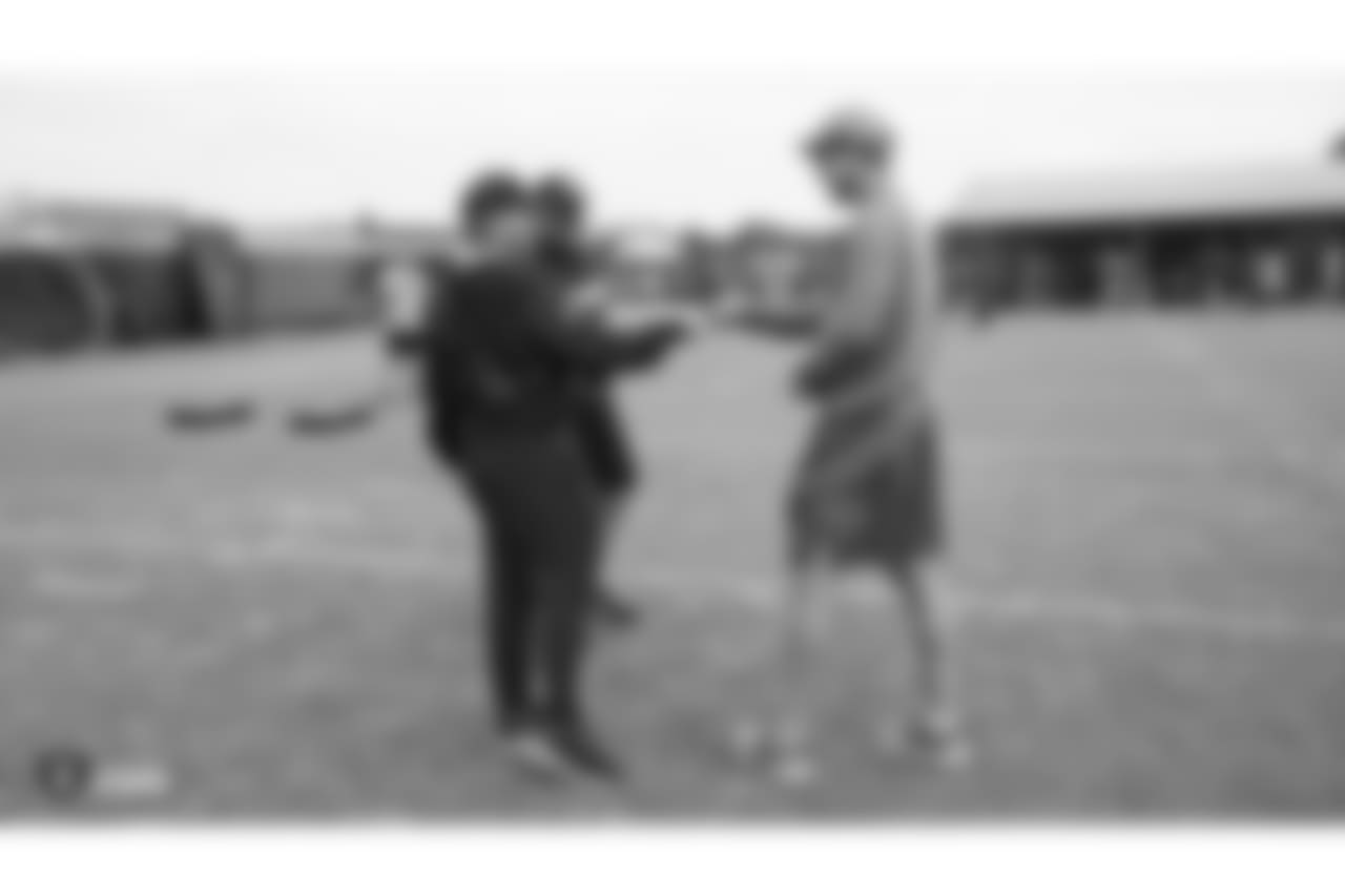 Oakland Raiders head coach Jon Gruden, director of video operations Joe Harrington, and former NFL quarterback Peyton Manning on the field for practice at 2018 Training Camp at The Oakland Raiders Napa Valley Training Complex, Thursday, August 2, 2018, in Napa, California.