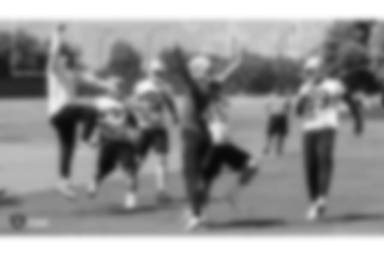 Oakland Raiders head coach Jon Gurden, running back DeAndre Washington (33), wide receiver Jordy Nelson (82), quarterback Derek Carr (4), and wide receiver Amari Cooper (89) at a Mandatory Minicamp at the Oakland Raiders Practice Facility, Wednesday, June 13, 2018, in Alameda, California.