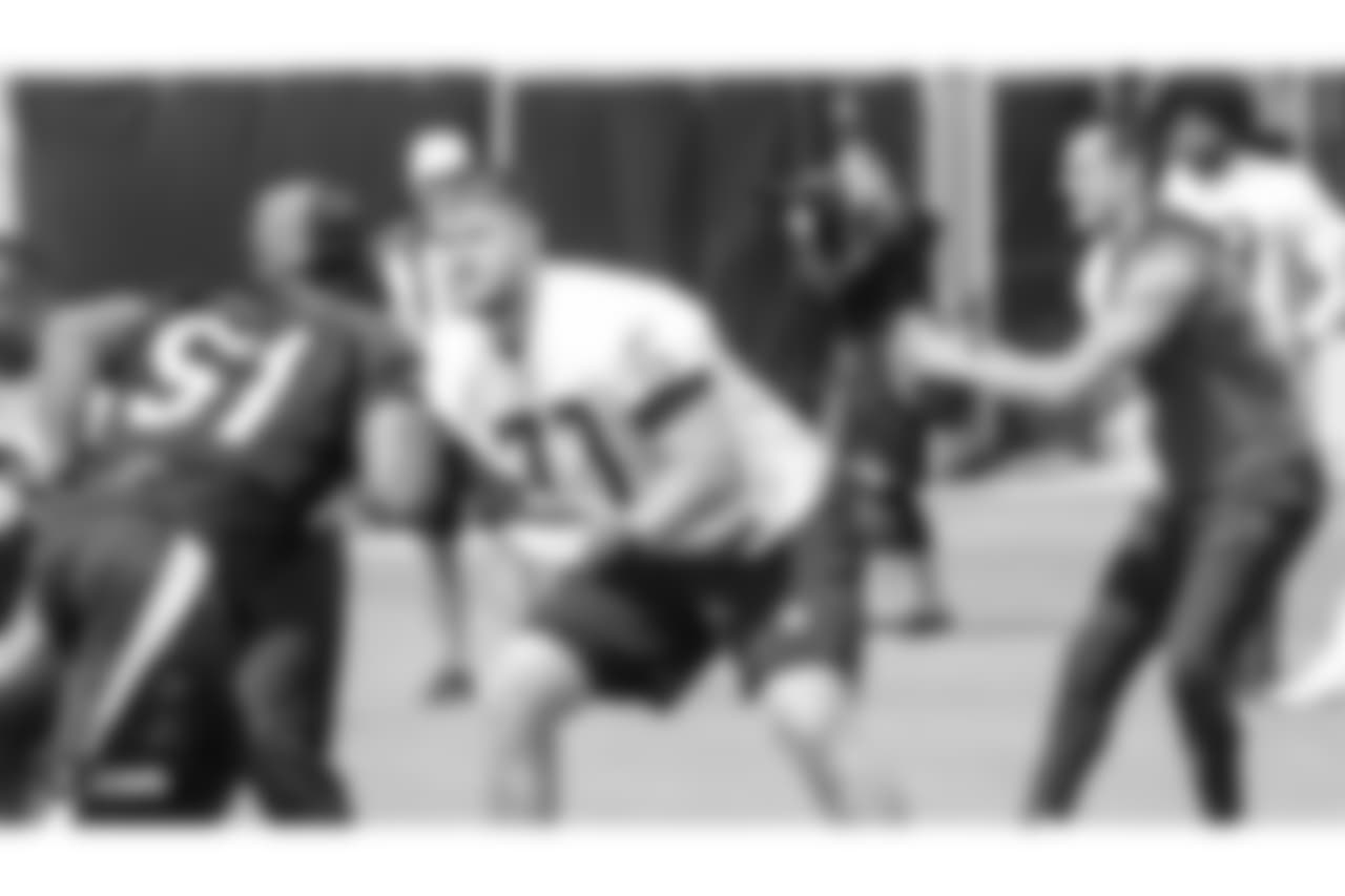 Oakland Raiders outside linebacker Bruce Irvin (51), offensive tackle Kolton Miller (77), and quarterback Derek Carr (4) at an Organized Team Activity (OTA) at the Oakland Raiders Practice Facility, Wednesday, June 6, 2018, in Alameda, California.