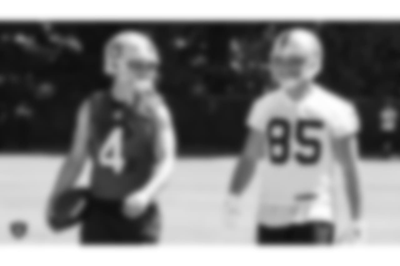 Oakland Raiders quarterback Derek Carr (4) and tight end Derek Carrier (85) on the field for practice at 2018 Training Camp at The Oakland Raiders Napa Valley Training Complex, Saturday, August 4, 2018, in Napa, California.