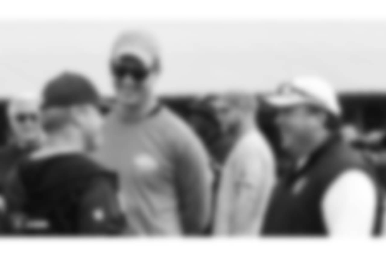 Oakland Raiders head coach Jon Gruden, defensive coordinator Paul Guenther, and former NFL quarterback Peyton Manning on the field for practice at 2018 Training Camp at The Oakland Raiders Napa Valley Training Complex, Thursday, August 2, 2018, in Napa, California.