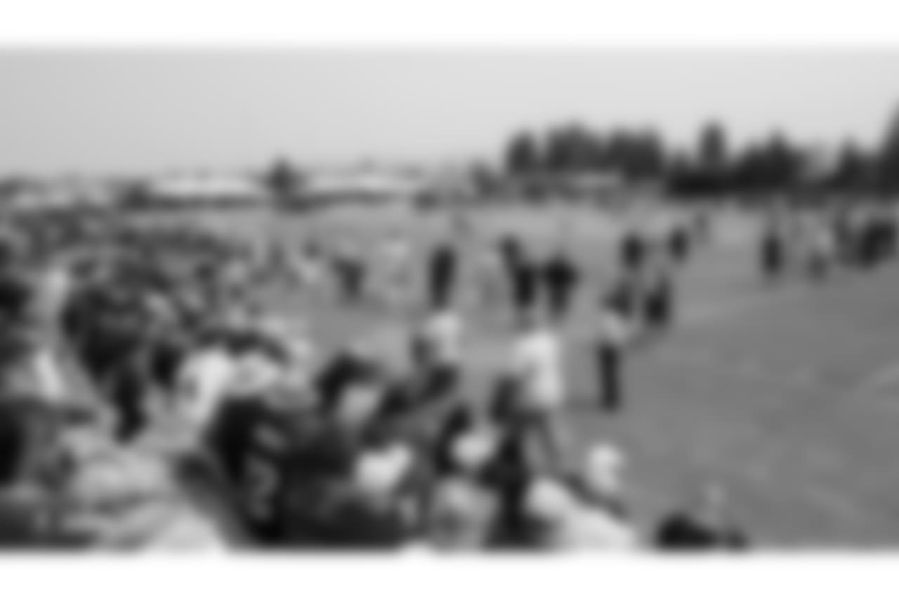 Oakland Raiders fans enjoy the the view of players and coaches on the field for a joint practice with the Detroit Lions at 2018 Training Camp at The Oakland Raiders Napa Valley Training Complex, Wednesday, August 8, 2018, in Napa, California.