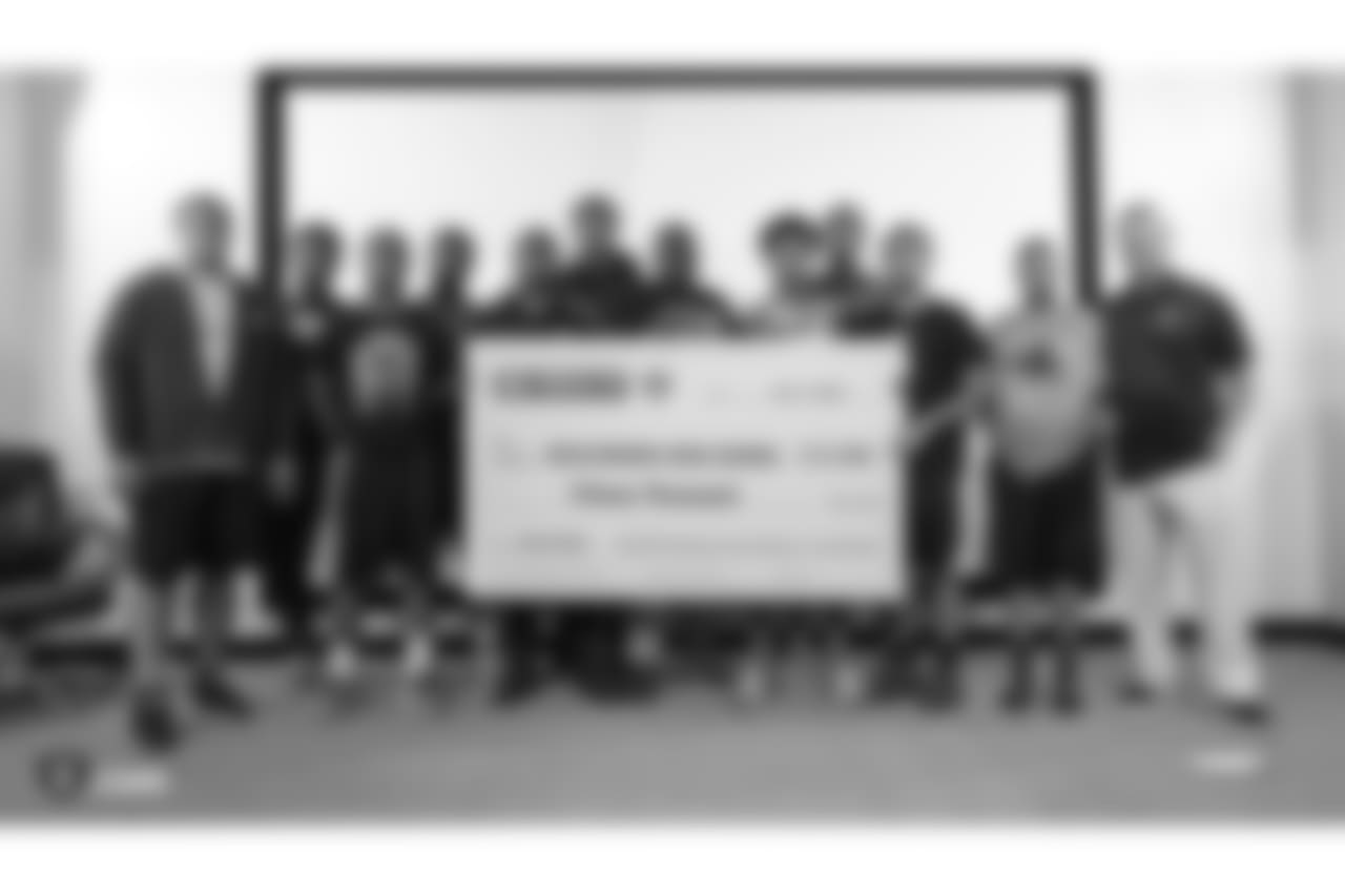 The Oakland Raiders and head coach Jon Gruden each match a $5000 donation by Dicks Sporting Goods Foundation's Sports Matters to both Oakland Tech High School and McClymonds High School's football programs. Accepting the donations were Oakland Tech High School's head coach Virdell Larkins Jr. and McClymonds High School's head coach Michael Peters, at the Oakland Raiders Practice Facility, Tuesday, July 17, 2018, in Alameda, California.