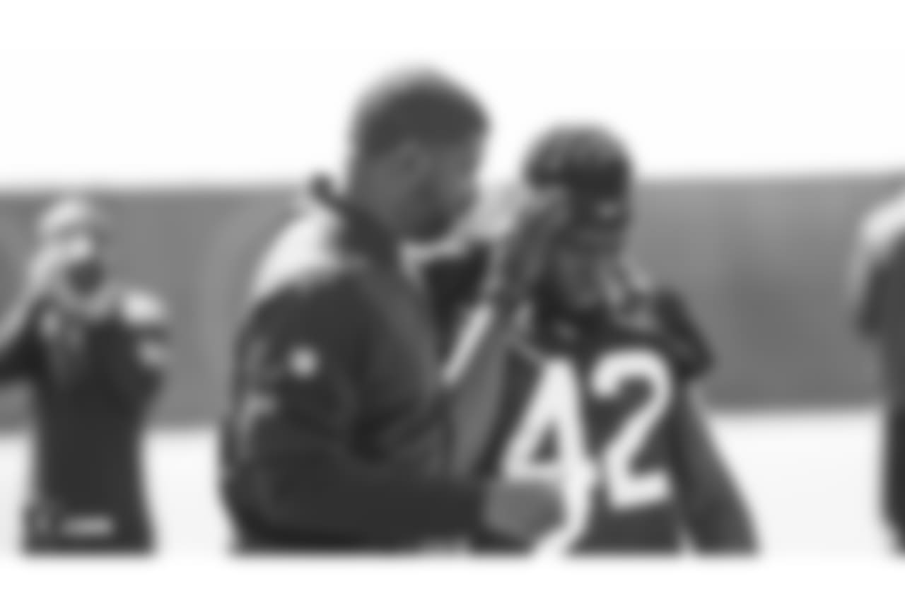 Oakland Raiders defensive backs coach Derrick Ansley and strong safety Karl Joseph (42) at an Organized Team Activity (OTA) at the Oakland Raiders Practice Facility, Monday, June 4, 2018, in Alameda, California.