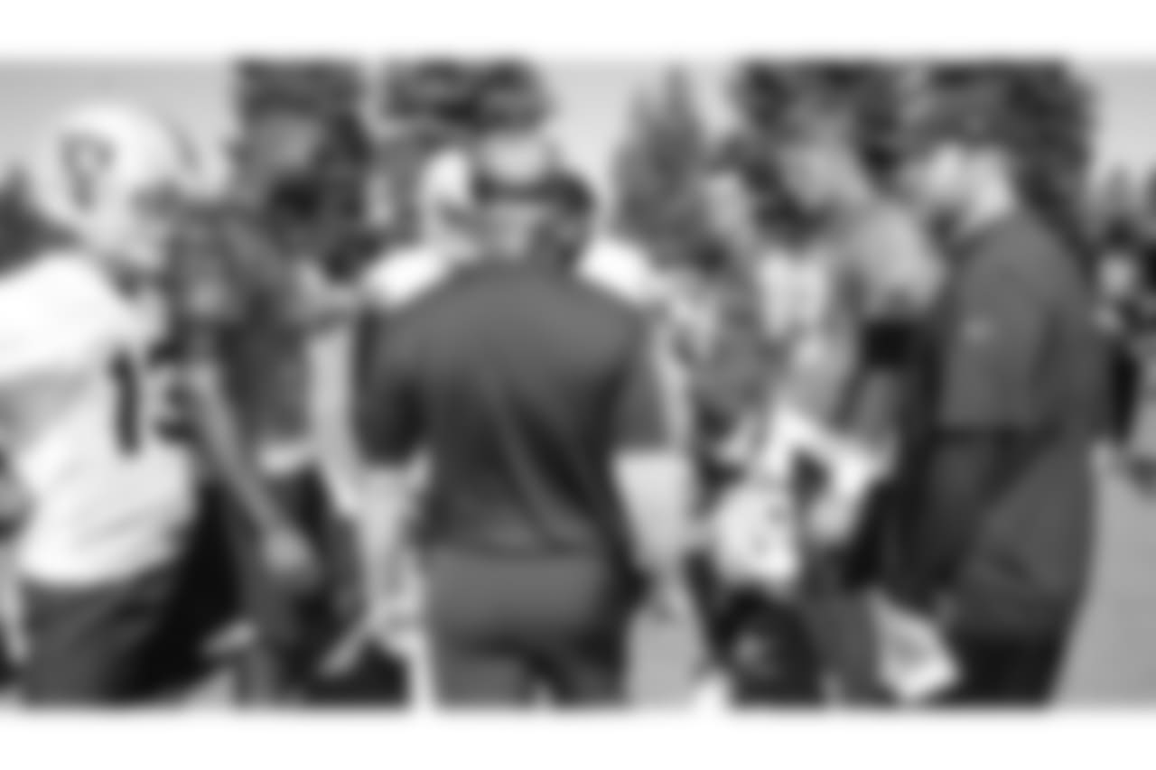 Oakland Raiders wide receiver Griff Whalen (13), quarterback EJ Manuel (3), fullback Keith Smith (41), head coach Jon Gruden, wide receiver Seth Roberts (10), quarterback Derek Carr (4), quarterback Connor Cook (18), and quarterbacks coach Brian Callahan on the field for practice at 2018 Training Camp at The Oakland Raiders Napa Valley Training Complex, Saturday, August 4, 2018, in Napa, California.
