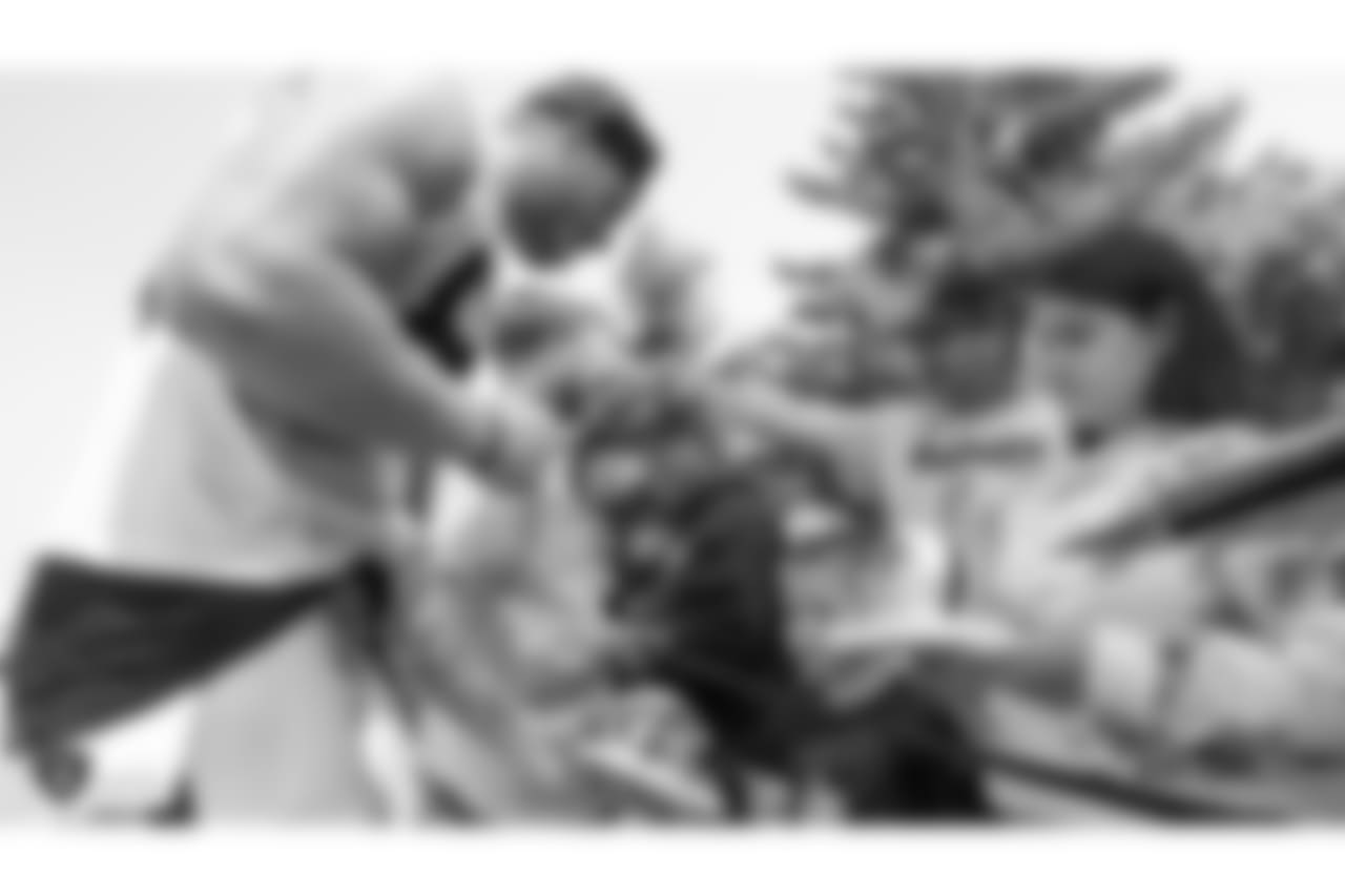 Oakland Raiders tight end Paul Butler (84) signs autographs for fans after practice at 2018 Training Camp at The Oakland Raiders Napa Valley Training Complex, Thursday, August 2, 2018, in Napa, California.